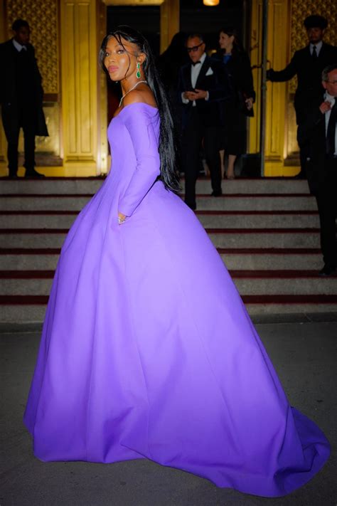 Naomi Campbell Embodies Fashion Royalty in Purple .